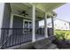Covered patio with outdoor kitchen and ceiling fans at 287 West Palms Dr., Myrtle Beach, SC 29579