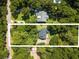 Bird's eye view of the property emphasizing its wooded surroundings and privacy at 309 Otter Run Rd., Pawleys Island, SC 29585