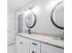 Stylish bathroom with double sinks, granite countertops, and modern lighting at 309 Otter Run Rd., Pawleys Island, SC 29585