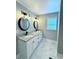 Contemporary bathroom featuring double sinks, granite counters and modern lighting fixtures at 309 Otter Run Rd., Pawleys Island, SC 29585