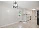 Inviting dining area with access to the kitchen and outdoor space at 309 Otter Run Rd., Pawleys Island, SC 29585