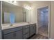 Primary bathroom with double sinks and closet at 311 Six Mile Creek Dr., Georgetown, SC 29440