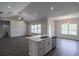 Island with stainless steel sink overlooks the kitchen area and dining area at 311 Six Mile Creek Dr., Georgetown, SC 29440
