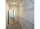 Spacious walk-in closet with wire shelving and neutral carpeting for organized storage solutions at 311 Six Mile Creek Dr., Georgetown, SC 29440