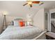 Upstairs bedroom featuring a decorative bed, ceiling fan and neutral colors for a peaceful ambiance at 312 Caldera Ct., Murrells Inlet, SC 29576