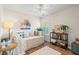 Cozy bedroom with decorative pillows, bright window and charming decor at 312 Caldera Ct., Murrells Inlet, SC 29576