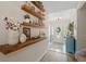 Inviting foyer with decorative shelves, stylish decor, and a view into the home's interior at 312 Caldera Ct., Murrells Inlet, SC 29576