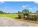 Golf course featuring well-maintained greens, mature trees, and clear signage for course navigation at 312 Caldera Ct., Murrells Inlet, SC 29576
