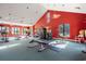 Well-equipped fitness center with various machines, natural light, and ample space for workouts and training at 312 Caldera Ct., Murrells Inlet, SC 29576