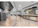 Modern restaurant area featuring stylish bar, comfortable seating, and large screen televisions for an engaging dining experience at 312 Caldera Ct., Murrells Inlet, SC 29576