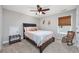 Cozy bedroom with carpeted floors, ceiling fan, and a window with natural light at 318 Board Landing Circle, Conway, SC 29526