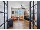 Beautiful living room with hardwood floors, a ceiling fan, and stylish furniture at 318 Board Landing Circle, Conway, SC 29526