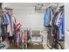 Walk-in closet features built-in shelving and rods for ample storage at 4136 Alvina Way, Myrtle Beach, SC 29579