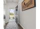 Bright foyer with hardwood floors, a patterned rug, and a glimpse of the home's exterior at 4136 Alvina Way, Myrtle Beach, SC 29579