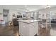 Open floor plan showcasing kitchen island, dining area and living room, creating a great space for entertaining at 4136 Alvina Way, Myrtle Beach, SC 29579