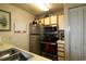 Efficient kitchen featuring stainless steel appliances and bright, white cabinetry at 423 Tree Top Ct. # 23-B, Myrtle Beach, SC 29588