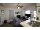 Inviting living room showcasing ceiling fan, lots of light and adjacent kitchen area at 423 Tree Top Ct. # 23-B, Myrtle Beach, SC 29588