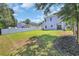 Expansive backyard with healthy green grass and privacy fence at 4329 Landing Rd., Little River, SC 29566