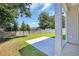 Backyard with small concrete patio and privacy fence at 4329 Landing Rd., Little River, SC 29566