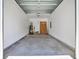 Clean garage with concrete floor and updated mechanicals and storage at 4329 Landing Rd., Little River, SC 29566