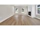 Expansive living room with fireplace, and abundant natural light at 4329 Landing Rd., Little River, SC 29566