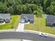Aerial view of a charming blue single Gathering home with a well-kept lawn in a suburban neighborhood at 437 Shallow Cove Dr., Conway, SC 29527