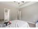 Comfortable bedroom with ceiling fan and private bathroom at 437 Shallow Cove Dr., Conway, SC 29527