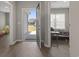 Open view of the entryway leading into a bedroom, showcasing the hardwood floors and natural light at 437 Shallow Cove Dr., Conway, SC 29527
