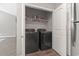 Laundry closet with washer, dryer, and shelves at 437 Shallow Cove Dr., Conway, SC 29527