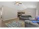 Bright living room with hardwood floors flows into the adjacent kitchen with views from the large windows at 437 Shallow Cove Dr., Conway, SC 29527