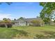 Exterior home view featuring backyard, with patio and privacy landscaping at 4709 National Dr., Myrtle Beach, SC 29579