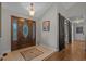 Welcoming entryway with an elegant front door, ceramic tile flooring, and stylish interior decor at 4709 National Dr., Myrtle Beach, SC 29579