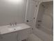 Bright bathroom featuring a tub shower and a modern single sink vanity at 4719 National Dr., Myrtle Beach, SC 29579