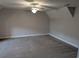 Cozy bedroom with neutral carpet, walls, ceiling fan and great natural light at 4719 National Dr., Myrtle Beach, SC 29579