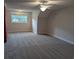 Comfortable bedroom with a ceiling fan and window to let in plenty of natural light at 4719 National Dr., Myrtle Beach, SC 29579