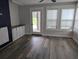 Sun room with tile flooring, door leading to outdoors, and lots of windows offering natural light at 4719 National Dr., Myrtle Beach, SC 29579
