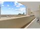 Balcony space equipped with seating for relaxing and enjoying the beautiful ocean view at 4719 S Ocean Blvd. # 108, North Myrtle Beach, SC 29582