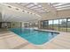 Enjoy the indoor pool with a glass ceiling and access to an outdoor view at 4719 S Ocean Blvd. # 108, North Myrtle Beach, SC 29582