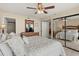 Bright main bedroom with a full bed and mirrored closets at 4719 S Ocean Blvd. # 108, North Myrtle Beach, SC 29582