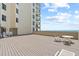 Spacious rooftop deck with ocean views, ideal for outdoor relaxation and entertaining at 4719 S Ocean Blvd. # 108, North Myrtle Beach, SC 29582