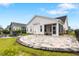 Beautiful backyard patio with custom stone pavers and outdoor seating area at 5087 Sundrop Ln., Little River, SC 29566
