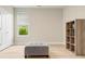 Unfurnished bonus room featuring hardwood floor, a window, and closet at 5087 Sundrop Ln., Little River, SC 29566