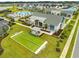 This aerial shows the luxurious community amenities which include a bocce ball court and community center at 5087 Sundrop Ln., Little River, SC 29566