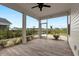 Relaxing screened-in porch with beautiful views, perfect for outdoor entertaining at 5087 Sundrop Ln., Little River, SC 29566