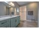 This bathroom offers a modern vanity with white counter-top and a glass door shower at 520 Oak Pond Ct., Conway, SC 29526