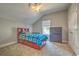 Cozy bedroom featuring a vaulted ceiling, carpet floors, and bright, natural light from the window at 520 Oak Pond Ct., Conway, SC 29526