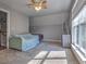 Bedroom featuring carpeted floors, a ceiling fan and windows for natural light at 520 Oak Pond Ct., Conway, SC 29526
