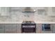 Modern kitchen boasts stainless steel appliances, sleek countertops, and a stylish backsplash at 520 Oak Pond Ct., Conway, SC 29526