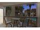Balcony with outdoor seating overlooking pool and neighboring villas at 5515 N Ocean Blvd. N # 206, Myrtle Beach, SC 29577