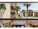 Serene balcony offers views of the complex, swimming pool, and surrounding landscape at 5515 N Ocean Blvd. N # 206, Myrtle Beach, SC 29577
